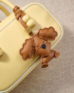 Handmade Leather Big-Ear Teddy Dog Charm (Tan with Gold Accent) - Image 2