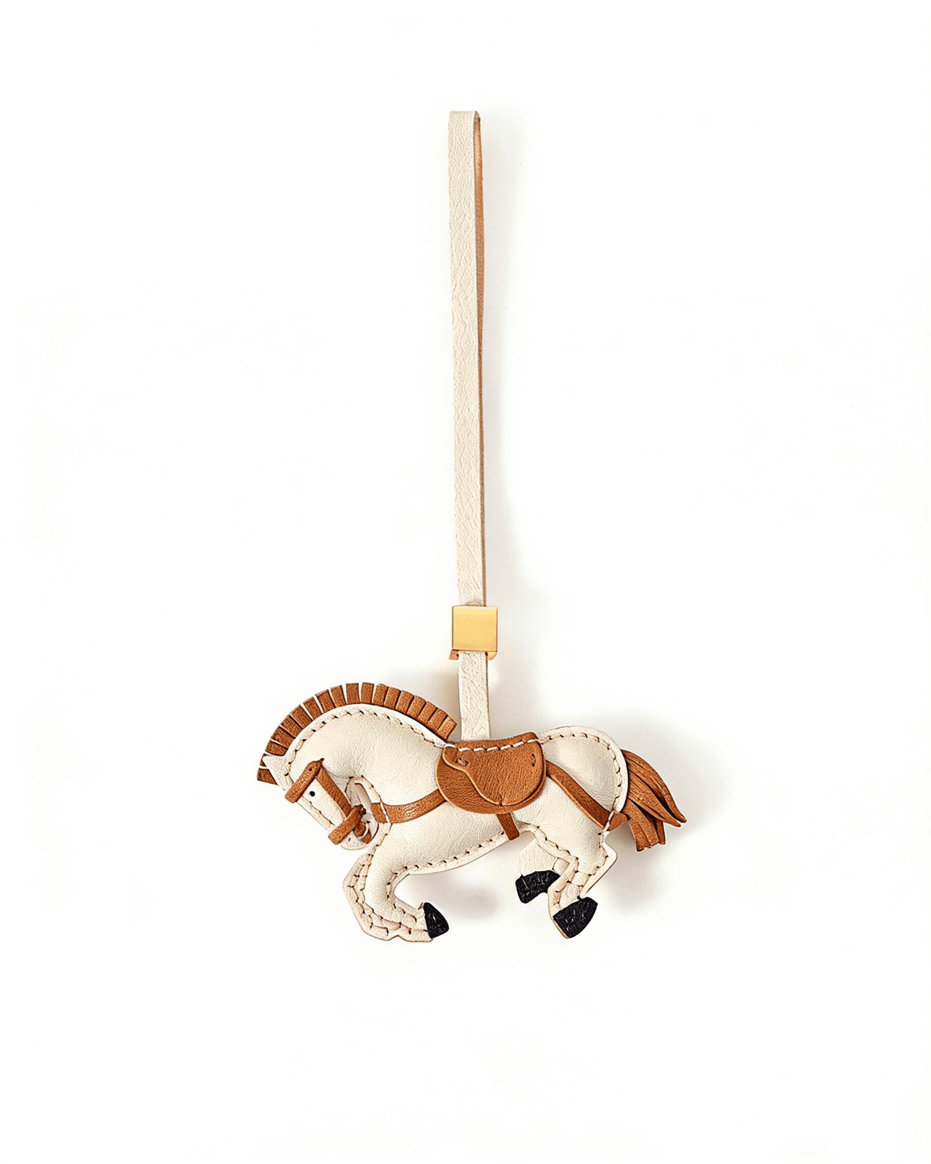 114 Handmade Leather Horse Charm (White with Brown Saddle) - Image 1