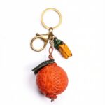 Handmade Leather Persimmon & Peanut Charm (Good Things Happen)