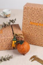 Handmade Leather Green Fruit & Flower Charm with Tassel Detail - Image 2