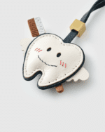 Handmade Leather Tooth Fairy Charm (Smiling Winged Tooth with Toothbrush Version) - Image 4