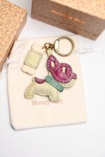 Handmade Leather Blush French Bulldog Charm (Pink-Ear Puppy with Bone Accent) - Image 2