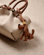 Handmade 3D Leather Dog Charm (Minimalist Tan Sitting Trotting Version) - Image 2