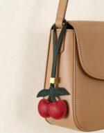 Handmade Leather Double Cherry Charm (Red with Green Leaves & Gold Accent) - Image 2