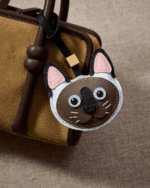 Handmade Leather Siamese Cat Head Charm (Brown & White with Gold Accent) - Image 2